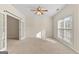 Bright office with french doors and ceiling fan at 228 Otter Cir, Fayetteville, GA 30215