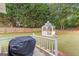 Relaxing patio with grill and view of the gazebo at 228 Otter Cir, Fayetteville, GA 30215