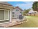 Cozy patio with grilling area and backyard access at 228 Otter Cir, Fayetteville, GA 30215