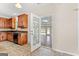Kitchen access to sunroom with tile floors and skylights at 228 Otter Cir, Fayetteville, GA 30215