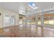Sunroom with skylights, tile floor, and backyard access at 228 Otter Cir, Fayetteville, GA 30215