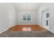 Bright dining room with hardwood floors and chandelier at 10231 Deep Creek Pl, Union City, GA 30291