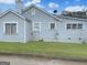 Gray siding house with multiple windows at 1683 Candler Rd, Decatur, GA 30032