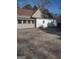 Home exterior showcasing a back patio and additional building at 4031 S Old Fairburn Road S Rd, South Fulton, GA 30349
