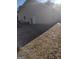Tan house exterior with a detached garage and yard at 4031 S Old Fairburn Road S Rd, South Fulton, GA 30349