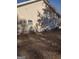 Tan house exterior with detached garage and yard at 4031 S Old Fairburn Road S Rd, South Fulton, GA 30349