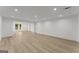 Spacious unfinished basement with wooden beams, white walls and concrete floor at 220 Early Parkway Se Dr, Smyrna, GA 30082