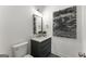 Charming powder room features a modern vanity, sleek mirror, and neutral decor at 220 Early Parkway Se Dr, Smyrna, GA 30082