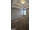 Cozy bedroom featuring neutral walls, a window, and plush carpeting at 7214 Bedrock Cir, Lithonia, GA 30038