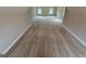 Expansive carpeted bonus room offers flexible space for recreation or relaxation at 7214 Bedrock Cir, Lithonia, GA 30038