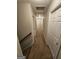 Upstairs hallway features carpet and several doors at 7214 Bedrock Cir, Lithonia, GA 30038