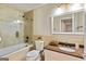 Clean bathroom with tub shower combo and granite countertop at 103 Sandtrap Rdg, Peachtree City, GA 30269