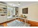 Bright home office features built-in shelving and hardwood floors at 103 Sandtrap Rdg, Peachtree City, GA 30269