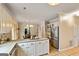 Spacious kitchen with island, stainless steel appliances, and breakfast area at 103 Sandtrap Rdg, Peachtree City, GA 30269