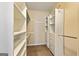 Large walk-in closet with ample shelving and hanging space at 103 Sandtrap Rdg, Peachtree City, GA 30269