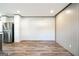 Spacious dining area with wood-look floors and stainless steel appliances at 1979 Cardell Rd # 20, Austell, GA 30168