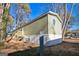 Another side view of the mobile home, highlighting its rear deck and AC unit at 1979 Cardell Rd # 20, Austell, GA 30168