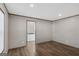 Spacious living room with hardwood flooring and access to the bathroom at 1979 Cardell Rd # 20, Austell, GA 30168