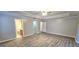 Large main bedroom with view to bathroom and hallway at 320 Valley View Dr, Fairburn, GA 30213