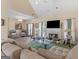 Inviting living room featuring a cozy fireplace and vaulted ceilings, creating a comfortable and spacious atmosphere at 2110 Kellington Dr, Mcdonough, GA 30253