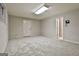 Spacious basement features neutral paint, carpeted floor and access to a door outside at 337 Legacy Ln, Peachtree City, GA 30269