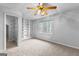 Bedroom featuring a window, a ceiling fan and wall to wall shelving at 337 Legacy Ln, Peachtree City, GA 30269