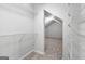 Walk-in closet with metal shelving and neutral carpet at 337 Legacy Ln, Peachtree City, GA 30269