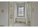 Hallway with a window seat, storage and access to the bathroom and walk-in closet at 337 Legacy Ln, Peachtree City, GA 30269