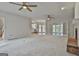 Bright living room featuring an open floorplan and fireplace at 337 Legacy Ln, Peachtree City, GA 30269