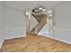 Spacious living room with hardwood floors and staircase at 337 Legacy Ln, Peachtree City, GA 30269