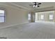 Neutral bedroom with carpet flooring and ample natural light at 4610 Point Rock Dr, Buford, GA 30519