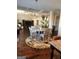 Open dining area with hardwood floors and natural light at 128 Lavender Way # 75, Mcdonough, GA 30252