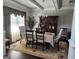 Elegant dining room with coffered ceiling and large windows at 128 Lavender Way # 75, Mcdonough, GA 30252