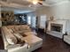 Comfortable living room with a fireplace and an open floor plan at 128 Lavender Way # 75, Mcdonough, GA 30252