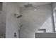 Luxurious shower with marble-look tiles and a rain shower head at 205 Belvedere Green, Peachtree City, GA 30269
