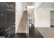 Inviting foyer with hardwood floors, a staircase leading to the upper level, and neutral wall paint at 1205 Heartwood Ave, Mcdonough, GA 30253