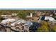 Aerial view of a charming downtown area with historic buildings, shops, and restaurants surrounded by lush trees at 459 Lester Rd, Fayetteville, GA 30215