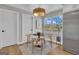 Cozy dining area with stylish lighting, a lake view, and modern decor at 459 Lester Rd, Fayetteville, GA 30215