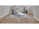 Bright exercise room with a yoga mat, plants, and ample natural light from the window at 459 Lester Rd, Fayetteville, GA 30215