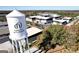 Aerial view of Trilith Studios with a water tower and soundstages in an industrial setting at 459 Lester Rd, Fayetteville, GA 30215
