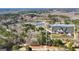 An aerial view showcases the 7.74-acre land lot's boundaries, surrounding landscape, and its proximity to the lake at 459 Lester Rd, Fayetteville, GA 30215