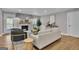 Comfortable living room features a modern fireplace, neutral tones, and plenty of natural light at 459 Lester Rd, Fayetteville, GA 30215