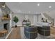 Cozy living room features a modern fireplace, neutral tones, hardwood floors, and plenty of natural light at 459 Lester Rd, Fayetteville, GA 30215