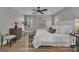 Bright main bedroom with stylish furnishings, hardwood floors, and abundant natural light at 459 Lester Rd, Fayetteville, GA 30215
