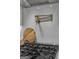 Close up of a stainless steel pot filler faucet and ZLINE stovetop with marble backsplash at 459 Lester Rd, Fayetteville, GA 30215