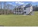 Beautiful home with a large backyard, dual decks, and elegant design, perfect for outdoor living at 459 Lester Rd, Fayetteville, GA 30215