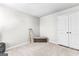 Bright bedroom features a large window, carpet, and decorative accents at 755 Gelderland Dr, Hampton, GA 30228
