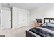 Spacious bedroom with double door closet and accent furnishings at 755 Gelderland Dr, Hampton, GA 30228