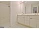 Bathroom featuring vanity with dual sinks and a shower over tub at 112 Windalier Rdg, Peachtree City, GA 30269