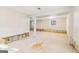 The unfinished basement with support beams offers a large area with potential for customization and additional living space at 6071 Cristie Dr, Ellenwood, GA 30294